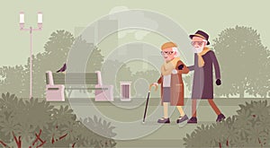 Active seniors, happy healthy elderly people walking through the autumn park