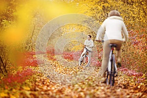 Active seniors riding bike