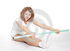 Active smiling young woman doing sport exercises