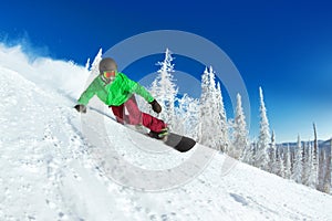 Active snowboarder snowboarding rides closeup