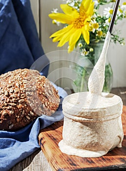 Active sourdough for bread, sourdough for making bread at home during the quarantine period. Healthy food concept made from