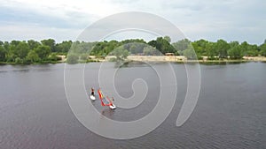 Active sport, windsurfing, surfers ride on the water