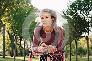 Active sport woman with bicycle