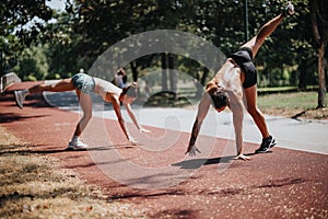 Active Sports Duo Showcasing Their Athleticism and Strength in a Natural Outdoor Environment