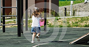 Active sports for preschoolers. Ball game for children. playing outside with a ball and walking on the playground in the park