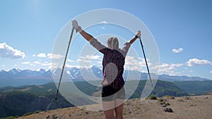 Active Tourist Climbs To Top And Raises His Hands Up Celebrating Success