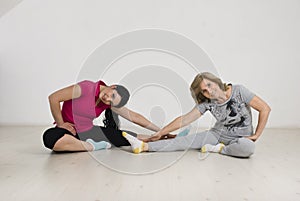 Active two women doing gymnastic