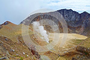 Active volcano Mount Egon with a caldera and sulfuric gasses coming from within the volcano on East Nusa Tenggara, Flores,