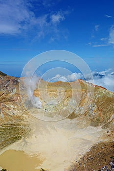 Active volcano Mount Egon with a caldera and sulfuric gasses coming from within the volcano on East Nusa Tenggara, Flores,