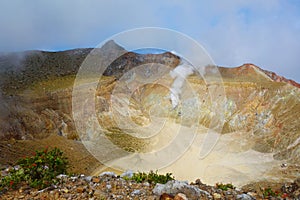 Active volcano Mount Egon with a caldera and sulfuric gasses coming from within the volcano on East Nusa Tenggara, Flores,