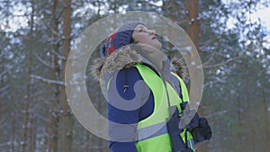 Active woman bird watching with binoculars