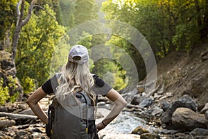 Active Woman hiking in a beautiful scenic mountain canyon