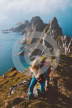 Active woman hiking in Norway travel with backpack trail running outdoor