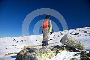 Active woman on rock