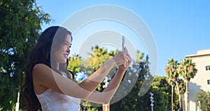 Active woman running up stairs to make city photo. Asian girl walking upstairs.