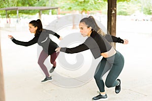 Active women doing a high-intensity interval training