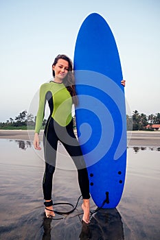 Active women with surf board enjoy watersport at vacation holidays.sport girl in surfing school instructor of windsurf