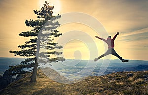 Active young man feeling free. Experience freedom in the heart of nature