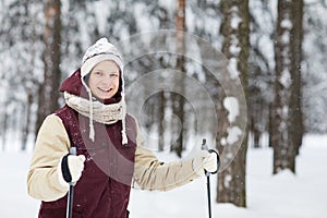 Active Young Man Skiing in Snow