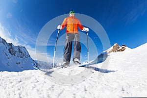 Active young man skiing view from below in Sochi