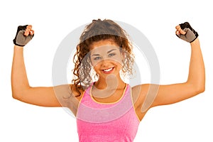 Active young sporty fit woman gesture power with her arms up iso