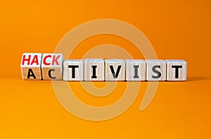 Activist or hacktivist symbol. Turned wooden cubes and changed the concept word Activist to Hacktivist. Beautiful orange table