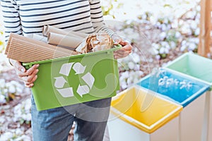 Activist sorting paper waste