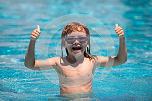 Activities child on the pool, children swimming and playing in water, happiness kids and summertime. Kid boy swim in