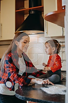 Activities for Kids in Coronavirus Quarantine. How Parents Can Keep Kids Busy and Learning in Quarantine. Mom and toddler daughter