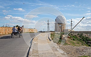 View on the Radar Station `il Ballun near the Dingli Cliffs in Malta on a clear sunny day. Stonewalls in the foreground