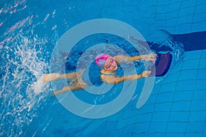 Activities on the pool children swimming fitness, competition