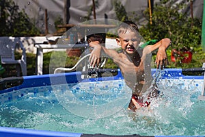 Activities on the pool, children swimming and playing in water, happiness and summertime