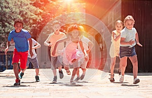 Activity children compete in the summer street