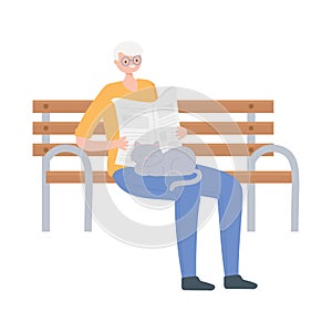 Activity seniors, old man reading newspaper in the park bench with cat