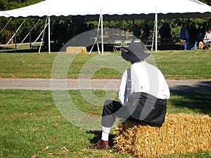 Actor in costume by marquee