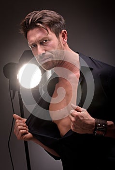 Actor in front of a light