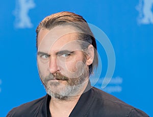 Actor Joaquin Phoenix poses during Berlinale 2018