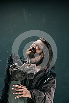 Actor in makeup, a poor man