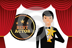 Actor wearing tuxedo holding gold star award
