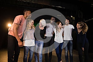 Actors practicing play on stage