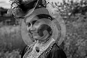 An actress dressed as a Russian noblewoman of the early 20th century.