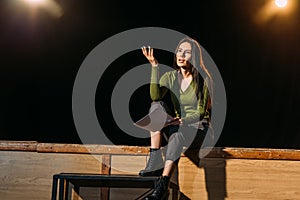 Actress performing role on stage in