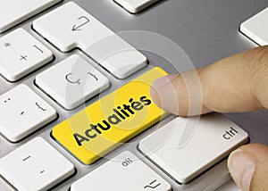 ActualitÃÂ©s - Inscription on Yellow Keyboard Key photo