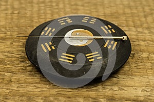 Acupuncture needle on Chinese Taoism symbol
