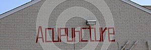 Acupuncture painted on a building