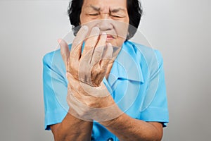 Acute pain in a senior woman wrist