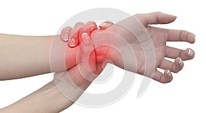 Acute pain in a woman wrist. Female holding hand to spot of wrist pain..Concept photo with Color Enhanced blue skin with read