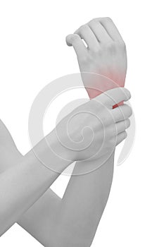 Acute pain in a woman wrist. Female holding hand to spot of wrist pain..Concept photo with Color Enhanced blue skin with read