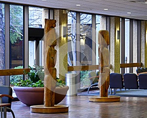 `Adam` left and `Eve` right, two wooden semi-abstract sculptures by American artist Helen Phillips in Dallas, Texas