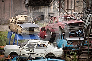 The adandoned scrapyard with cars